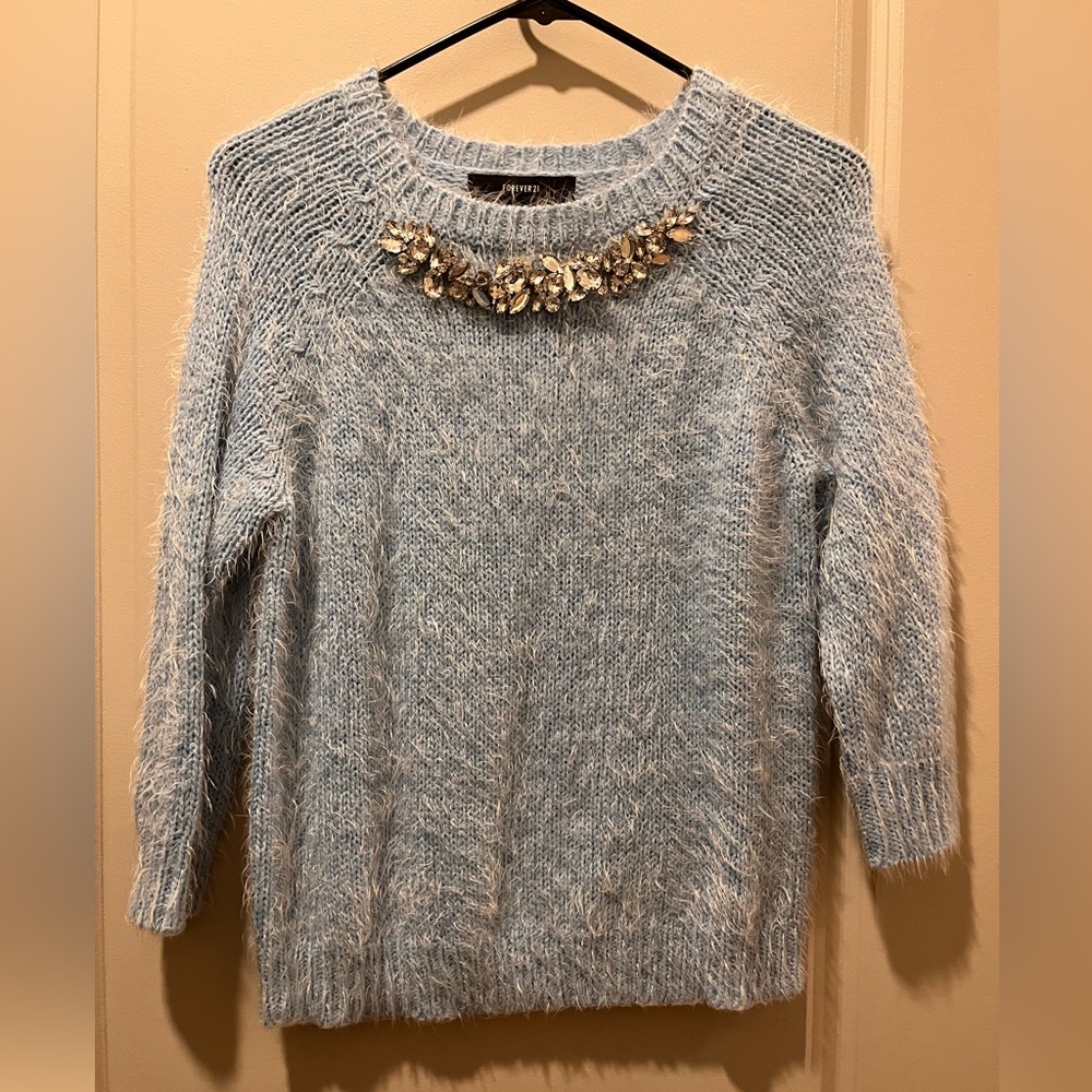 Baby blue sweater with built in jewels